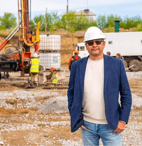 Man in hard hat at construction site.